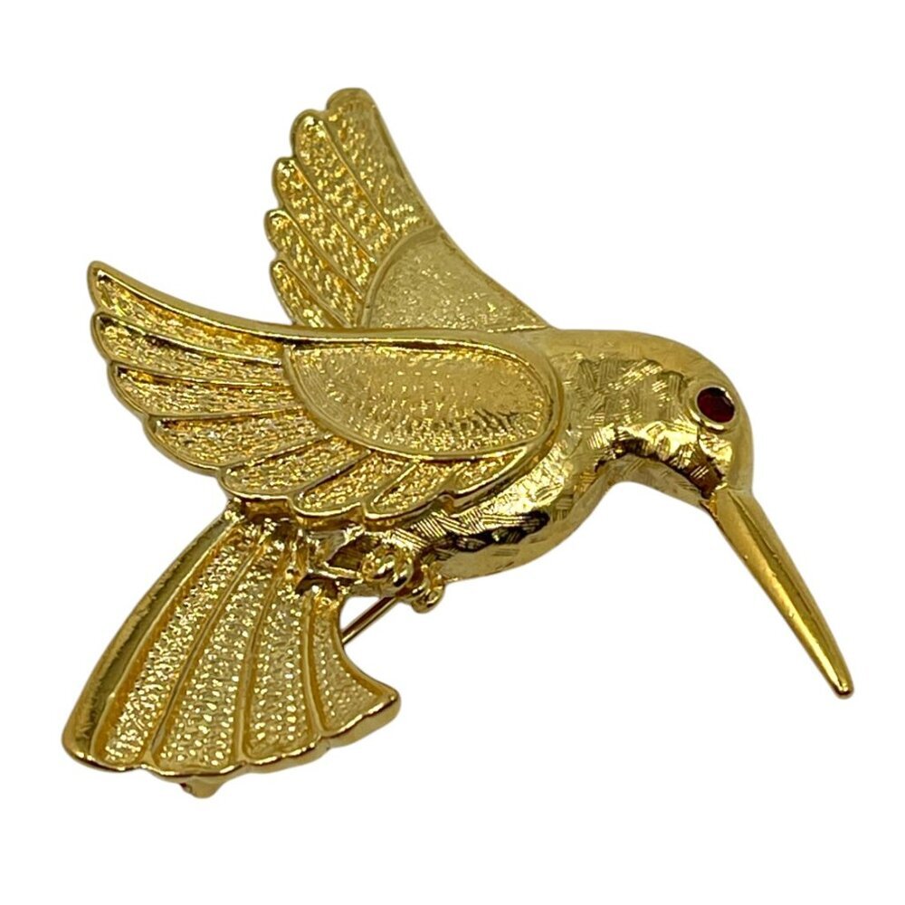 Avon Gold Tone Hummingbird Bird Brooch Pin Red Rhinestone Eye Textured Wings